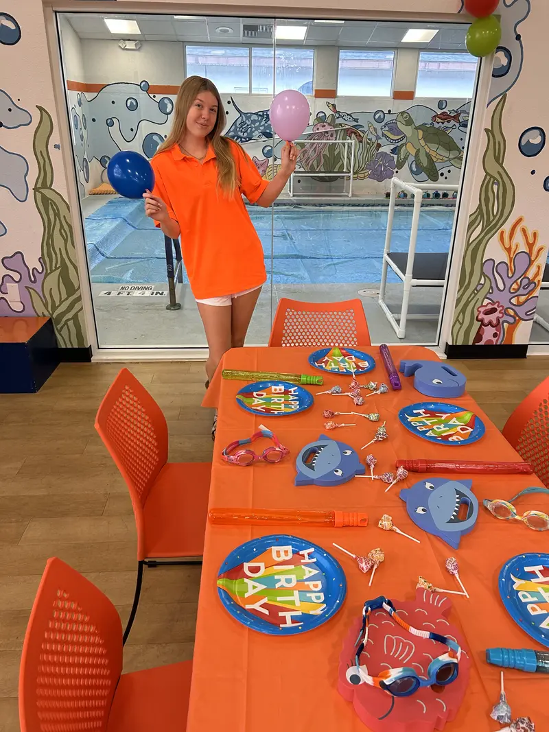 Birthday Party Page 3 Birthday party set up in a rec room at Fintastic Swim Academy